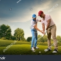 stock-photo-male-golf-players-on-professional-golf-course-golfer-teaches-to-play-golf-1278190207 